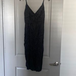 Black slip dress with slit